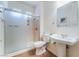 Bathroom with a shower, toilet, and sink with vintage fixtures at 3029 Brownbirds Nest Dr, Henderson, NV 89052