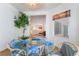 Cozy breakfast nook with round table, seating and natural light at 3029 Brownbirds Nest Dr, Henderson, NV 89052