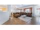 Spacious living room featuring tile flooring, large sofa, and open layout perfect for entertaining at 3029 Brownbirds Nest Dr, Henderson, NV 89052