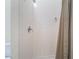 Shower stall with white tiles, chrome fixtures and a shower curtain at 3029 Brownbirds Nest Dr, Henderson, NV 89052