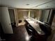 Bathroom with double sink vanity with stone countertop and dual glass-enclosed showers at 3167 El Cedro Cir, Las Vegas, NV 89121