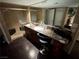 Spacious bathroom with a double vanity, large mirror, and walk-in shower at 3167 El Cedro Cir, Las Vegas, NV 89121