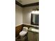 Bathroom with marble countertops, tiled floor, and accented walls at 3606 Gold Sluice Ave, North Las Vegas, NV 89032