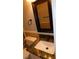 Cozy bathroom with granite countertop, vanity and framed mirror at 3606 Gold Sluice Ave, North Las Vegas, NV 89032