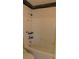Bathroom with tiled tub, shower and upgraded fixtures at 3606 Gold Sluice Ave, North Las Vegas, NV 89032