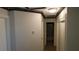Hallway with accented walls and access to multiple rooms at 3606 Gold Sluice Ave, North Las Vegas, NV 89032