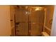 Bathroom shower area with a glass enclosure, highlighting functionality at 3606 Gold Sluice Ave, North Las Vegas, NV 89032