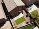 Aerial view shows artificial turf, concrete patio and desert landscape at 3736 Gallowtree Ave, North Las Vegas, NV 89081