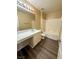 Clean bathroom featuring a vanity with quartz countertop and a shower-tub combo at 3736 Gallowtree Ave, North Las Vegas, NV 89081