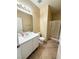 Bathroom featuring a single vanity, tile flooring, and a glass-enclosed shower at 3736 Gallowtree Ave, North Las Vegas, NV 89081