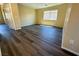 Spacious bedroom with wood-look flooring, a window, and neutral wall colors at 3736 Gallowtree Ave, North Las Vegas, NV 89081