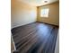 Bedroom showcasing wood floors, offering a stylish and easy-to-maintain living space at 3736 Gallowtree Ave, North Las Vegas, NV 89081