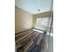 Cozy bedroom with new wood-look flooring, neutral walls, and a window providing natural light at 3736 Gallowtree Ave, North Las Vegas, NV 89081