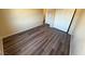 Bright bedroom features wood floors and closet space, enhancing a comfortable living space at 3736 Gallowtree Ave, North Las Vegas, NV 89081