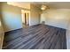 Spacious bedroom featuring vaulted ceilings, vinyl floors, and an ensuite bathroom at 3736 Gallowtree Ave, North Las Vegas, NV 89081