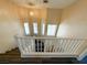 View from the top of the staircase with natural light at 3736 Gallowtree Ave, North Las Vegas, NV 89081