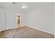 Cozy carpeted bedroom with closet, ceiling light, and white walls at 3769 Fairlawn Ave, Las Vegas, NV 89121