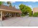 Resident carport with a shaded roof and walkway to the community at 3769 Fairlawn Ave, Las Vegas, NV 89121