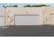 Exterior view of a two-car garage with a white door and unit number at 3769 Fairlawn Ave, Las Vegas, NV 89121