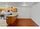 Open concept view of kitchen, offering granite counters and wood cabinets at 3769 Fairlawn Ave, Las Vegas, NV 89121