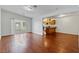 Spacious living room with sliding glass door and view of kitchen at 3769 Fairlawn Ave, Las Vegas, NV 89121