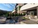 Backyard pool area features a patio with outdoor seating and barbecue overlooking mountains at 3961 Heron Fairway Dr, Las Vegas, NV 89141