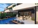 Private backyard with a pool, patio, and dining area for outdoor entertaining at 4086 Heron Fairway, Las Vegas, NV 89141