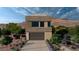Modern two-story home with desert landscaping and a two-car garage at 4086 Heron Fairway, Las Vegas, NV 89141