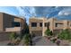 Contemporary homes featuring private driveways and modern architectural design at 4086 Heron Fairway, Las Vegas, NV 89141