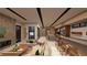Spacious living room open to the kitchen with modern finishes and decor at 4086 Heron Fairway, Las Vegas, NV 89141