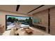 Cozy living room featuring a fireplace and seamless indoor-outdoor living at 4086 Heron Fairway, Las Vegas, NV 89141