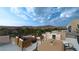Outdoor living with fireplace and comfortable seating at 4086 Heron Fairway, Las Vegas, NV 89141