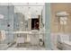 Elegant bathroom featuring marble tiling, modern fixtures, and a spacious glass-enclosed shower at 4381 W Flamingo Rd # 5103, Las Vegas, NV 89103