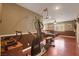 Basement workout area equipped with machines and a ceiling fan at 4415 Peaceful Harbor St, Las Vegas, NV 89129