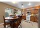 Bright kitchen with a dining table and modern appliances at 4415 Peaceful Harbor St, Las Vegas, NV 89129