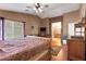 Warm and inviting main bedroom with a view into the ensuite bathroom at 4415 Peaceful Harbor St, Las Vegas, NV 89129