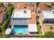 View of home with a sparkling pool, covered patio and a manicured yard at 444 Viewmont Dr, Henderson, NV 89015