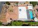 Aerial view shows the pool and patio area along with desert landscaping at 444 Viewmont Dr, Henderson, NV 89015