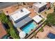 Stunning aerial view of a home with a private pool and covered patio, perfect for outdoor entertaining at 444 Viewmont Dr, Henderson, NV 89015