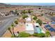 Residential aerial shot showcasing desert landscaping and a built-in swimming pool at 444 Viewmont Dr, Henderson, NV 89015