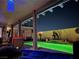 Relaxing backyard setting with a sparkling pool, comfortable seating, and ambient lighting at 444 Viewmont Dr, Henderson, NV 89015