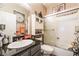 Bathroom featuring a tub/shower combo and stylish decor at 444 Viewmont Dr, Henderson, NV 89015