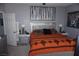Well-appointed bedroom with contemporary decor, stylish lamps, and comfortable bedding at 444 Viewmont Dr, Henderson, NV 89015