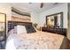Well-decorated bedroom with a large mirror and a comfortable bed at 444 Viewmont Dr, Henderson, NV 89015