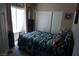 Inviting bedroom with natural light, and sliding closet door at 444 Viewmont Dr, Henderson, NV 89015
