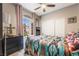 Bedroom featuring natural light, a window, and a spacious closet at 444 Viewmont Dr, Henderson, NV 89015