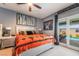Bright bedroom with access to the pool and a decorative accent wall at 444 Viewmont Dr, Henderson, NV 89015