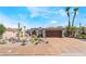 Charming single story home with desert landscaping, sidewalk, and beautiful front yard appeal at 444 Viewmont Dr, Henderson, NV 89015