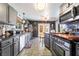 Well-equipped kitchen with stainless steel appliances and ample counter space at 444 Viewmont Dr, Henderson, NV 89015
