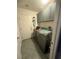 Functional laundry room with modern washer and dryer units and overhead cabinets at 444 Viewmont Dr, Henderson, NV 89015